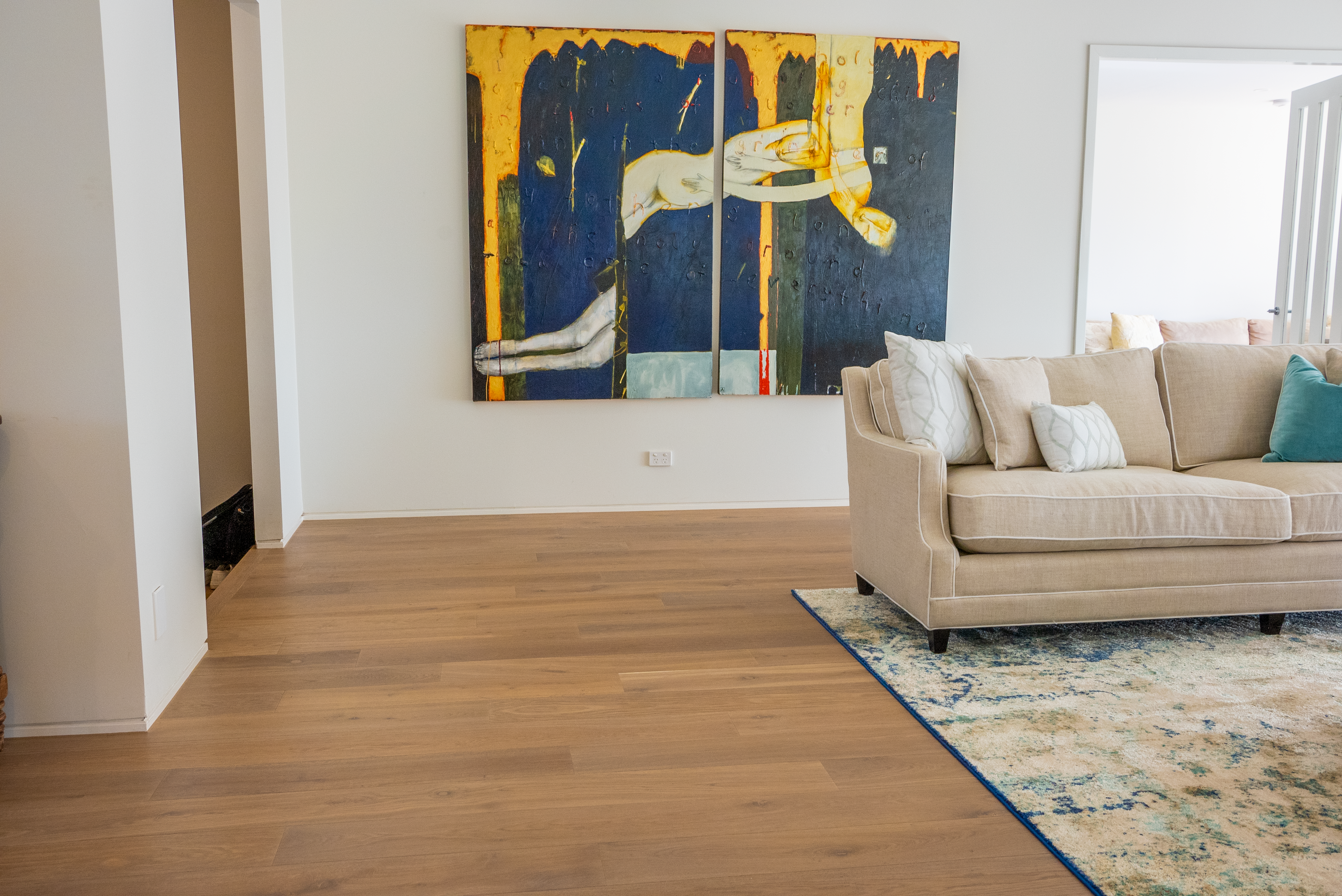 Peninsula farm residence &mdash; living room with contemporary artwork